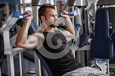 Young man in sport gym club Stock Photo