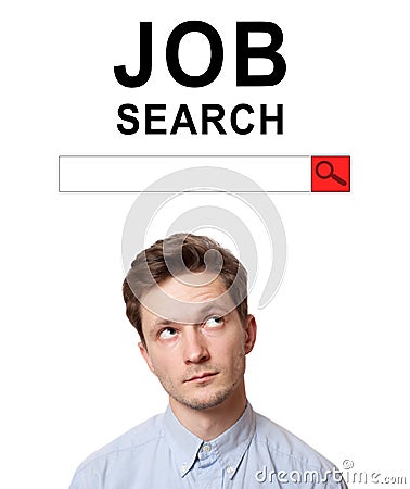 Young man with surprised eyes peeking out from behind billboard on inscription Stock Photo