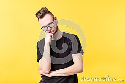 Young man suspicious wary bored look skepticism Stock Photo