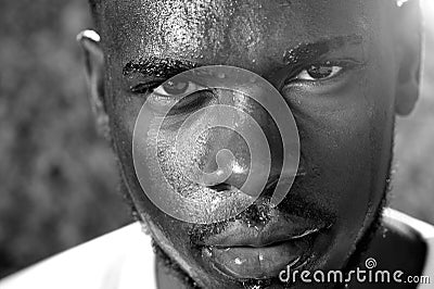 Young man sweating with intense look of face Stock Photo