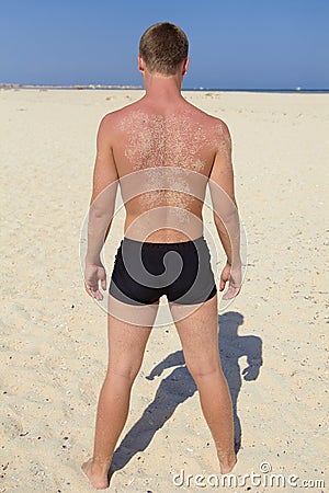 Young man in swimming trunks Stock Photo