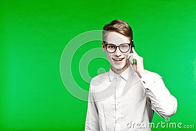 Young man talking by phone and smiliing Stock Photo