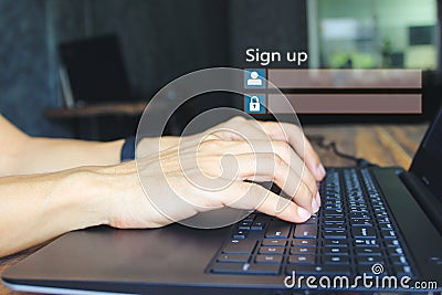 Young man using laptop computer and sign up or log in username password in home office, GDPR.cyber security and privacy concept Stock Photo