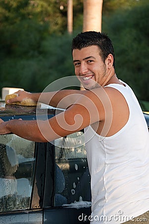 Young man washing the car Stock Photo
