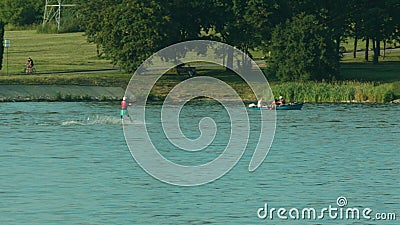 Young Man Waterskiing on the Lake Stock Photo