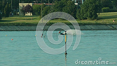 Young Man Waterskiing on the Lake Stock Photo