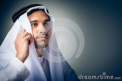 Young Man Wearing Traditional Arabic Clothing Stock Photo