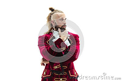 The young man wearing a traditional medieval costume of marquis Stock Photo