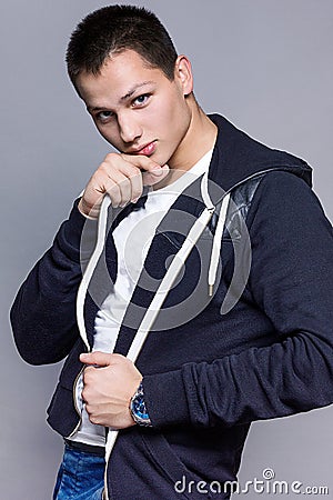 Young man in white T-shirt and Hoodie Stock Photo