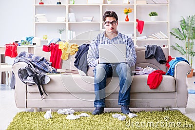 The young man working studying in messy room Stock Photo