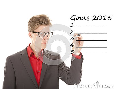 Young man writing goals 2015 isolated Stock Photo