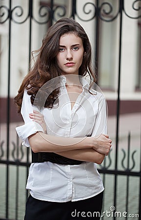 Young manager standing in the street Stock Photo
