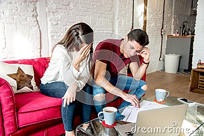 Young married couple with finance problems and emotional stress Stock Photo