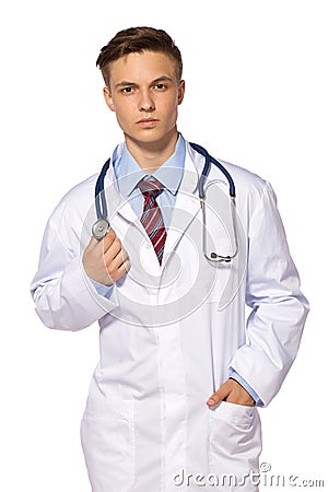 Young medic doctor - serious man in white gown with stetoskope Stock Photo