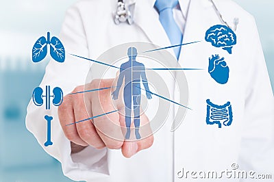 Young medic pointing on modern hologram with internal organs Stock Photo