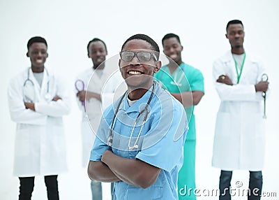 Young medic standing in front of his friends colleagues Stock Photo