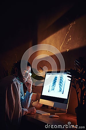 Young medic is working on night shift Stock Photo