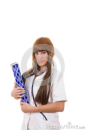 Young medical student nurse in uniform on practice taking notes Stock Photo