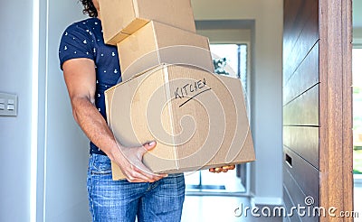 Man carrying moving boxes Stock Photo