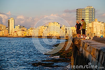 Young men fishing in Havana at sunset Editorial Stock Photo