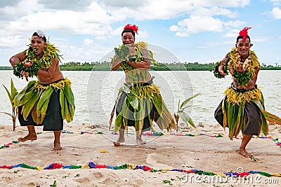 Dancers South Pacific. Young men dressed with typical dresses made from nature dancing traditional dances in Tonga. Editorial Stock Photo