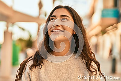 Young middle east girl smiling happy standing at the city Stock Photo