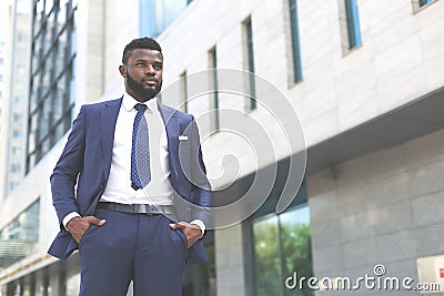 Young millenial african businessman looks ready for the competition Stock Photo