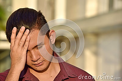 Young Minority Adult Male And Sadness Stock Photo