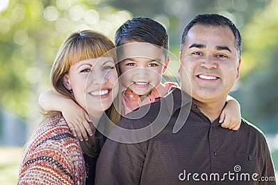 Young Mixed Race Family Portrait Outdoors Stock Photo