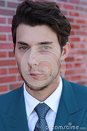 Young modern business man confident standing outdoors Stock Photo