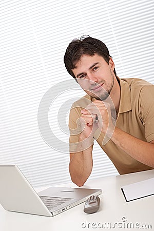 Young modern businessman with laptop Stock Photo