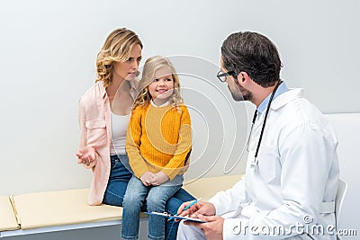 young mother and daughter visiting pediatrist Stock Photo