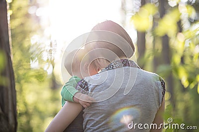 Young mother enjoying a beautiful moment of love, tenderness and Stock Photo