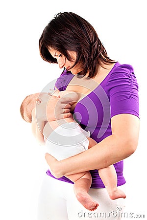 Young mother feeding her little baby with breast Stock Photo