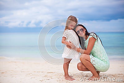 Young mother and her little daughter in hats have Stock Photo