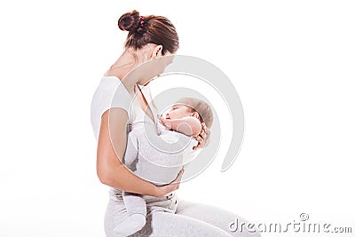 Young mother holding her baby Stock Photo