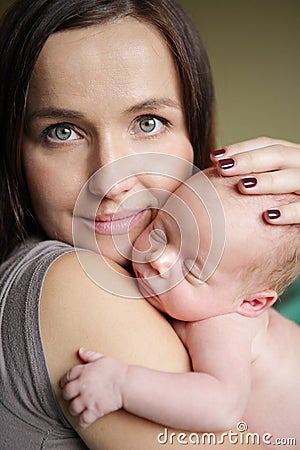 Young mother with new born baby. Stock Photo