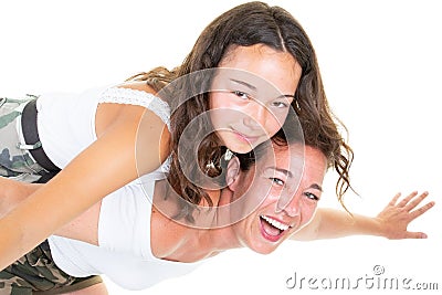 Young mother playing with daughter girl teen on white Stock Photo