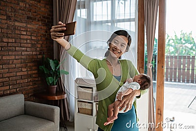 Young mother selfie with little daughter Stock Photo