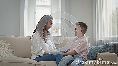 Young Mother and Son on the Couch. Mom Hugs the Boy. they Have Fun. Stock Footage - Video of family, barefoot: 207150204 