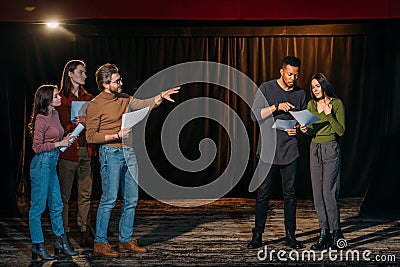 Multiethnic actors and actresses rehearsing with Stock Photo