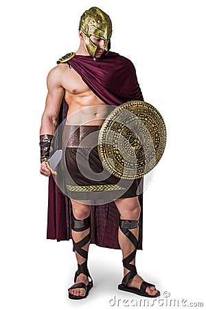 Young muscular man posing in gladiator costume Stock Photo