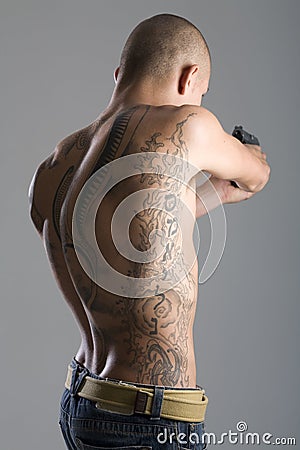 Young Muscular Tattooed Man Stock Photo