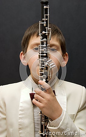 Young musician with oboe Stock Photo