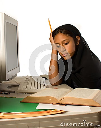 Young Muslim girl studying Stock Photo