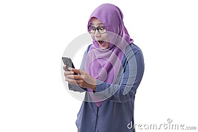 Young Muslim Woman Get Shock Surprised Get Good News on Her Phone Stock Photo