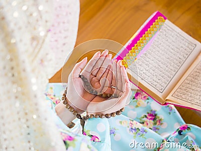 Young muslim woman praying for Allah Stock Photo