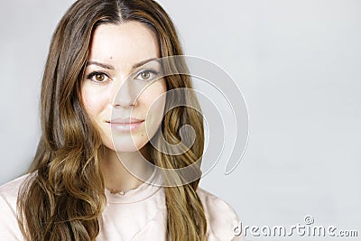 Young Natural Woman with pretty Long Brown Hair Stock Photo