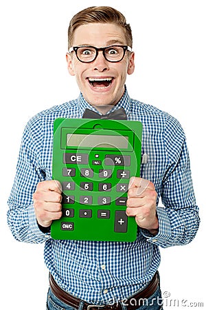 Young nerd showing big green calculator Stock Photo