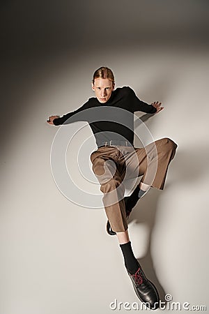 young non binary model in black Stock Photo